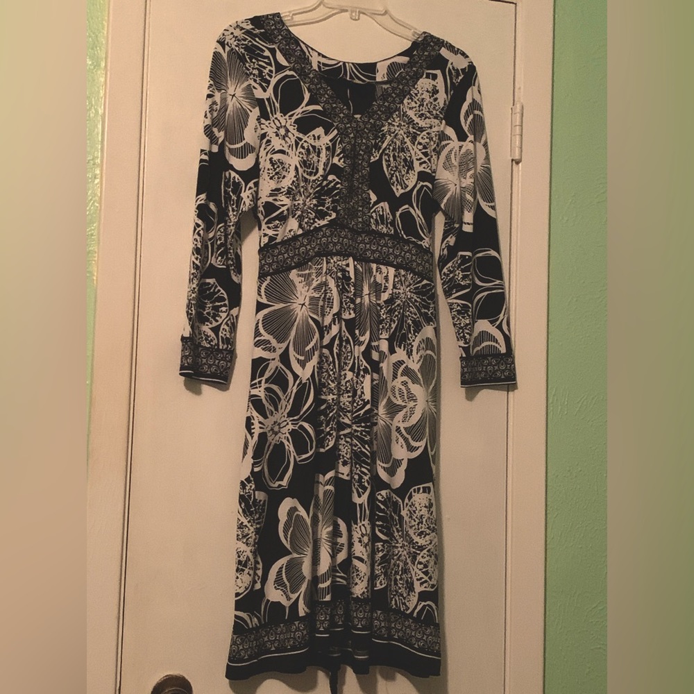 Women’s dress size 12, polyester and 3% spandex.